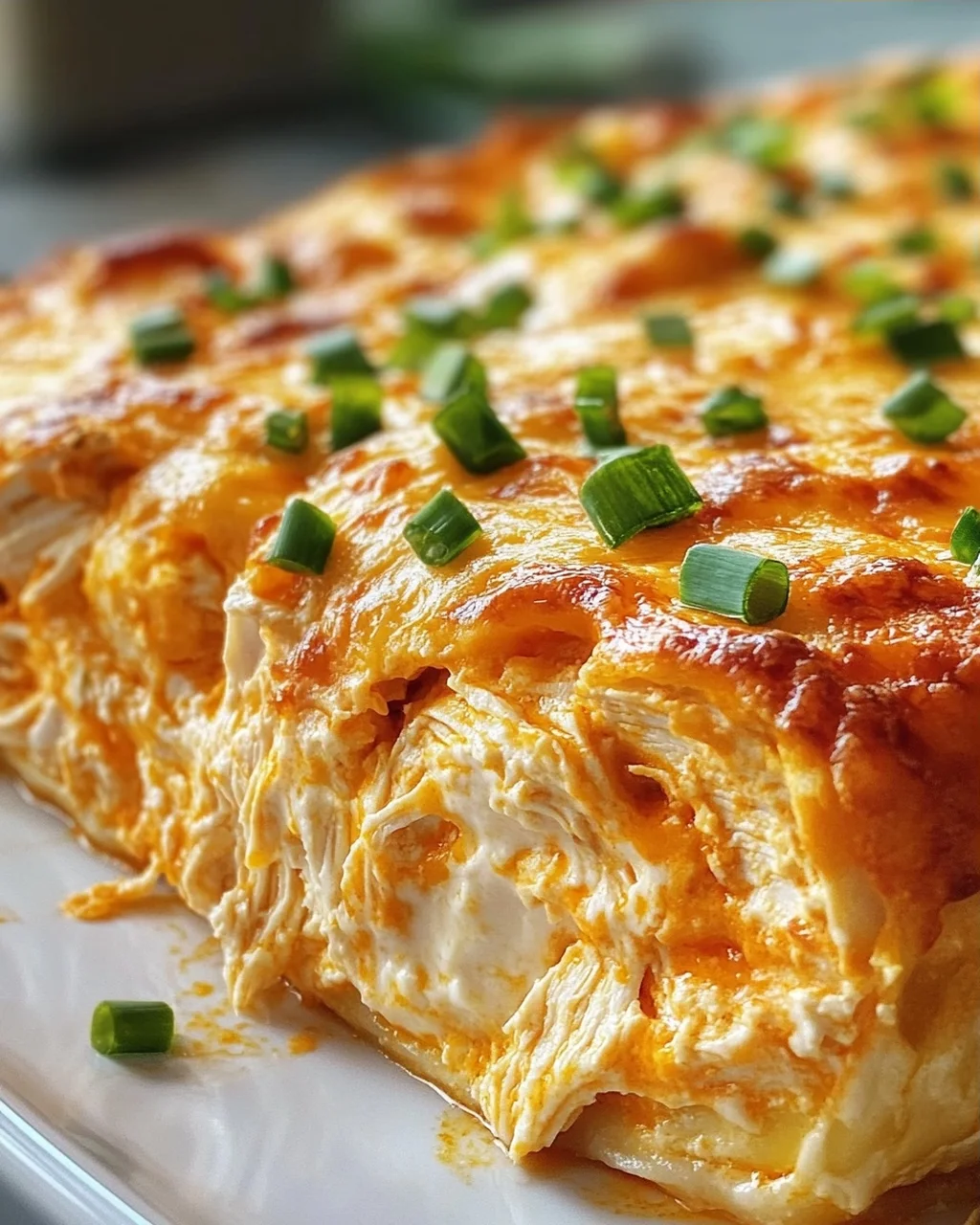 Cremiger Buffalo Hähnchen Käse Auflauf – Einfach & Lecker!